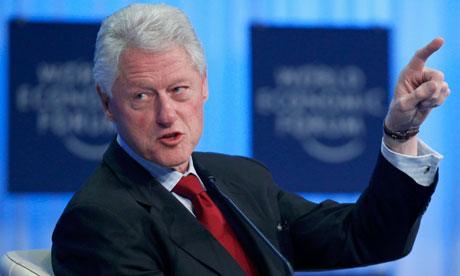 Former U.S. president Bill Clinton attends a session at the WEF in Davos
