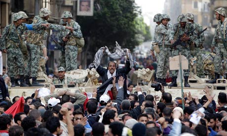 Hundreds of anti-government protesters returned Saturday to the battered streets of central Cairo