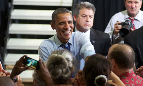 OBAMA STEPS UP CRITICISM OF ROMNEY IN BATTLE FOR WOMEN VOTERS