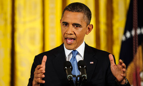 Obama talks tough over fiscal cliff and refuses to buckle on GOP ...