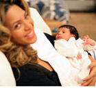 Beyonce Knowles holds her daughter Blue Ivy in a recent family photo