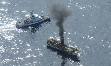 Tsunami 'GHOST SHIP' sinks after US coastguard opens fire