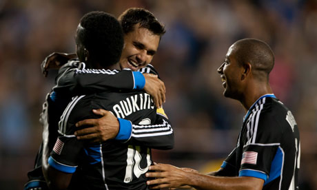 San Jose Earthquakes' Chris Wondolowski celebrates with teammate Simon Dawkins
