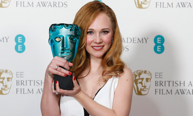 Juno Temple holds her Bafta Rising Star award