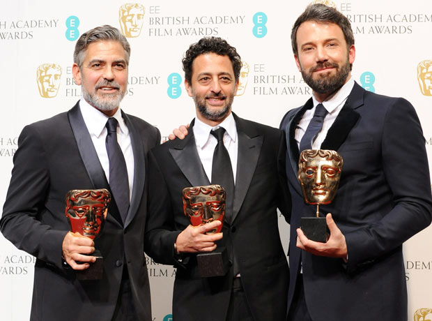 George Clooney, Grant Heslov and Ben Affleck hold their Baftas for best picture, which went to Argo