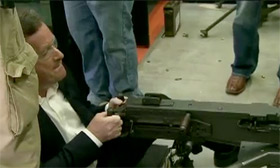 PIERS MORGAN FIRES MACHINE GUN AT SHOOTING RANGE