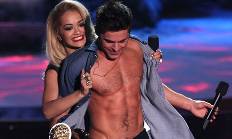 Rita Ora accosts Zac Efron at the MTV movie awards