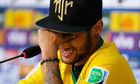 Neymar cries during a news conference