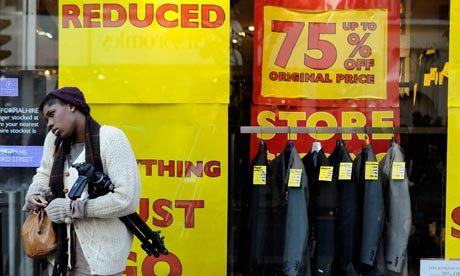 A shop displays sale signs on Oxford Street in central London
