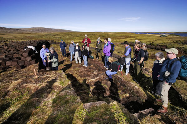 Tourists Watching Peat Digging Demonstration