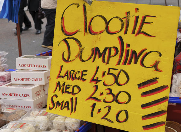 Clootie dumplings for sale at a market