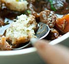 Beef and Guinness stew with horseradish dumplings