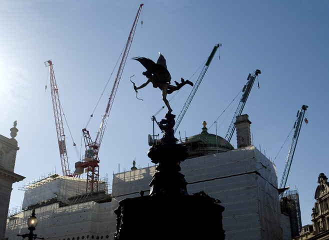 Construction work surrounds Eros in Piccadilly Circus, London