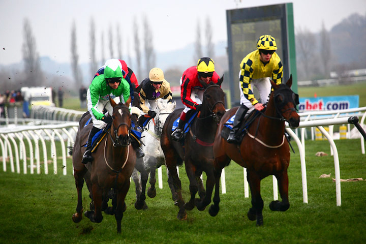 Enjoy England Newbury: Mud flies as riders near the finishing post in the penultimate race