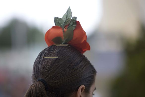 Photography masterclass: A woman wears a red hat in Seville