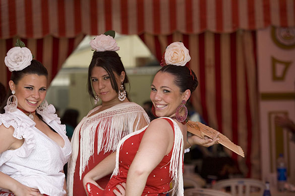 Photography masterclass: Three women pose for the camera in Seville