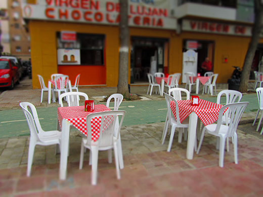 Photography masterclass: Table and chairs outside a cafe