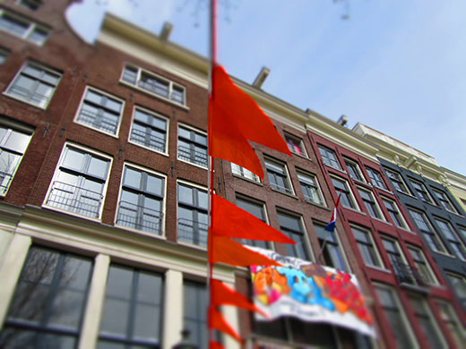 Abstract: Buildings and flags in Amsterdam