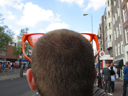 Abstract: A man wearing over-sized glasses 