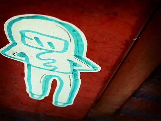 Abstract: A tiny cartoon on a wall 