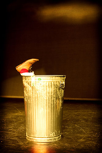Portraiture masterclass: An acrobat squeezes into a dustbin