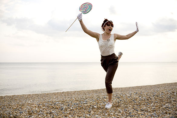 Portraiture masterclass: A woman dancing on Brighton beach