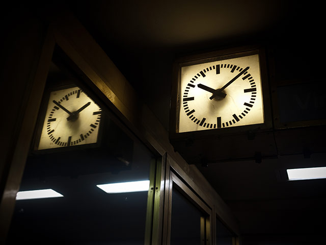 Berlin Panasonic: Clock reflected in a mirror