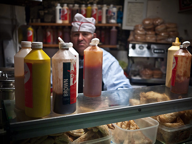 Panasonic East London: Sauces on a counter in a greasy spoon