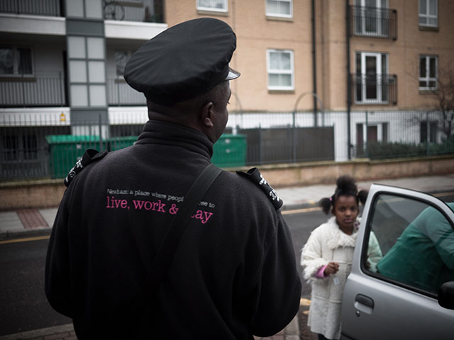 Panasonic East London: A traffic warden watches a motorist