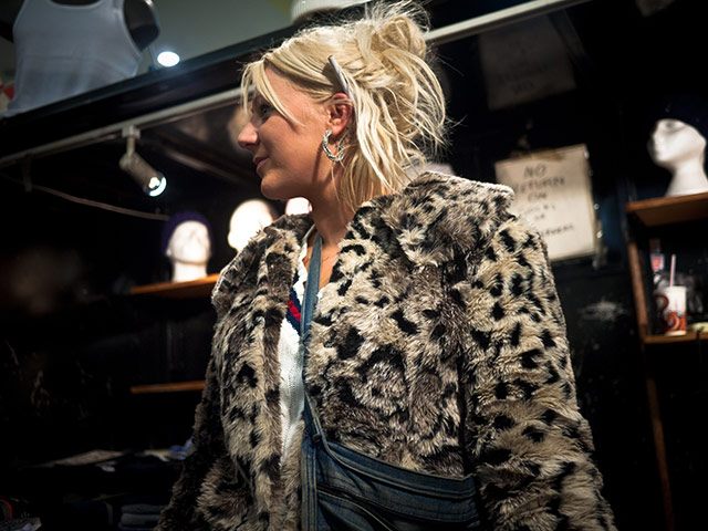 Panasonic East London: A young woman working at a market stall