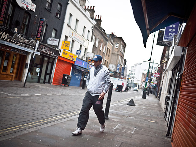 Panasonic East London: A man walks down a desreted Brick Lane in the morning