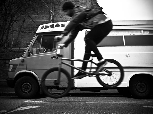 Panasonic rooftop rider: A biker jumps over a sleeping policeman