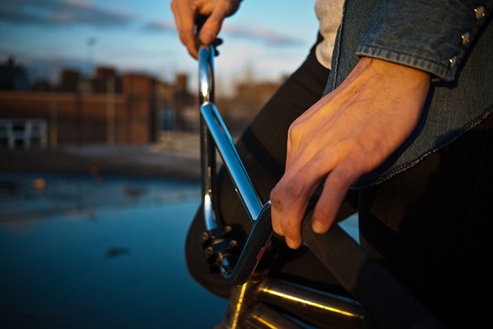Panasonic rooftop rider: A close up of hands and handlebars on the roof