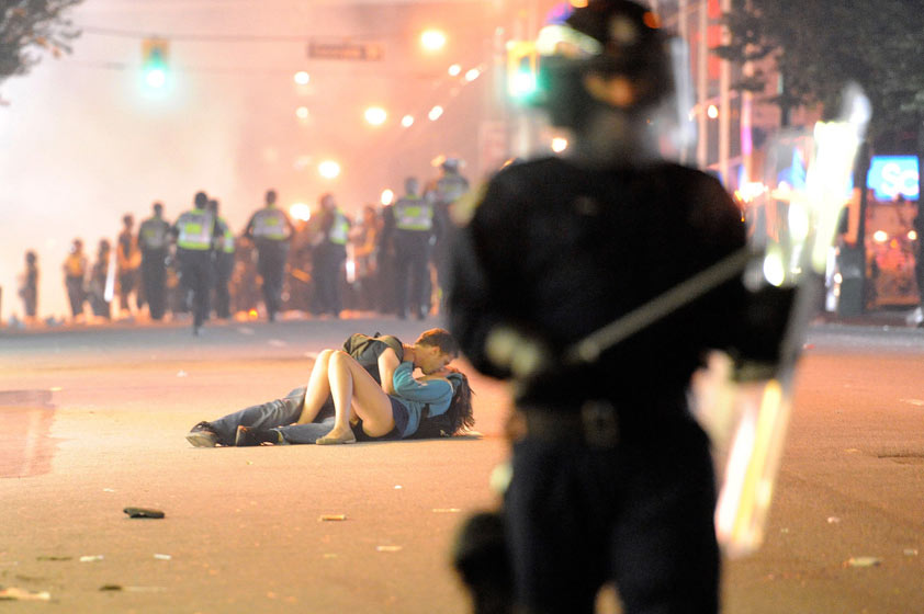 oddman11:  remember when the internet immortalized the picture of the couple kissing in the vancouver riots? forget white people kissing in inappropriate places the only picture that belongs in the louvre is the picture of the man in the american flag