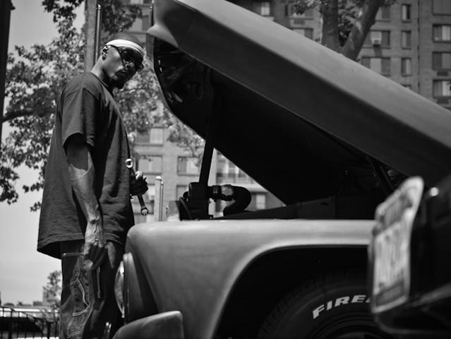 Panasonic G3 | NYC: Man fixing a car with bonnet open