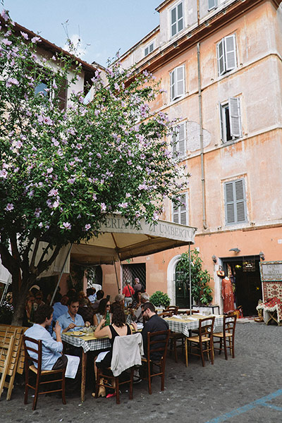 Parioli - Taste of Rome: People eating al fresco in a Roman piazza