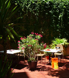 Le Boutique Hôtel is a stylish 18th-century townhouse with a colourful courtyard