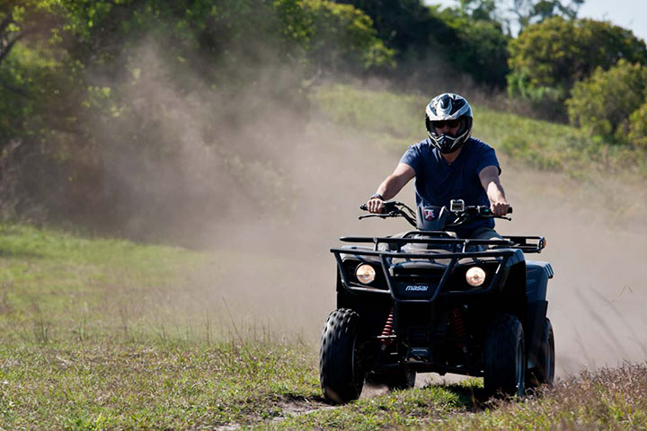 South Africa – : Jamie Theakston on a quad bike