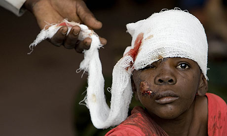 http://static.guim.co.uk/sys-images/Guardian/Pix/contributor/2010/1/14/1263488479383/Haiti-quake-aid-boy-recei-001.jpg