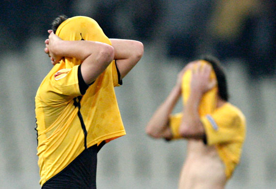 24sport: AEK Athens' Krisztian Nemeth, left, and a team-mate react in disbelief 