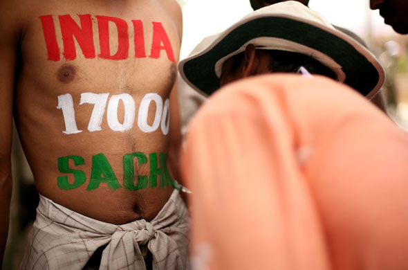 24sport: An India cricket fan has his body painted in support of Sachin Tendulkar 