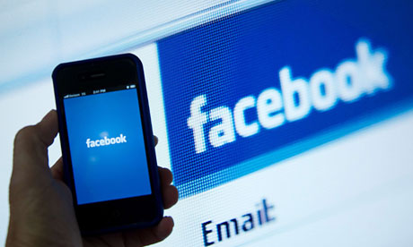 Facebook on screen and mobile