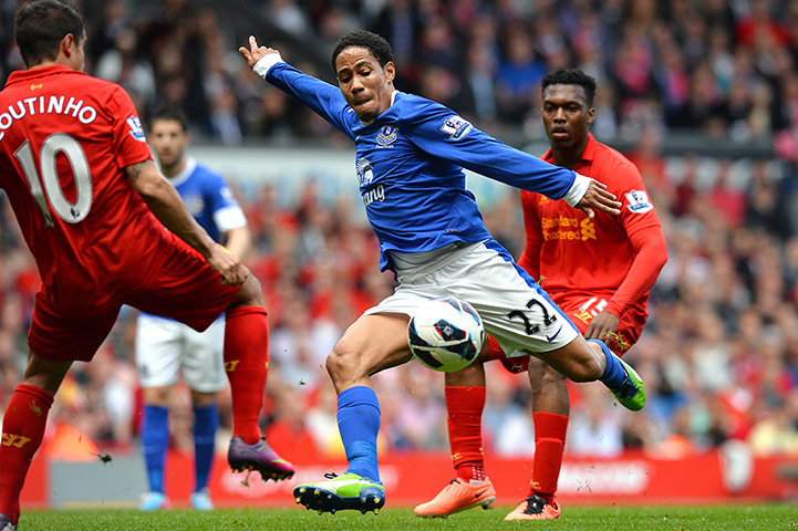 Liverpool v Everton: Everton's South African midfielder Steven Pienaar (C) shoots at goal