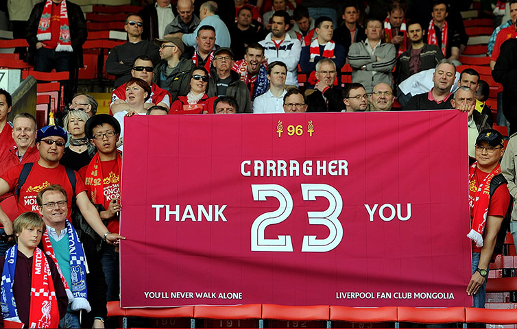 Liverpool v Everton: Fans hold banner aloft saying thank you to Jamie Carragher before the derby
