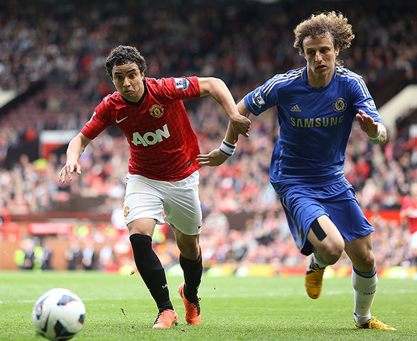 Manchester Utd vs Chelsea: Rafael da Silva of Manchester United battles with David Luiz of Chelsea