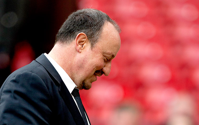 Manchester Utd vs Chelsea: Chelsea's manager Rafa Benitez smiles he walks from the pitch