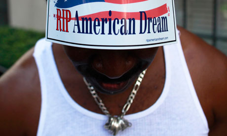 A member of the Occupy Wall Street movement protests on 5th Avenue in New York