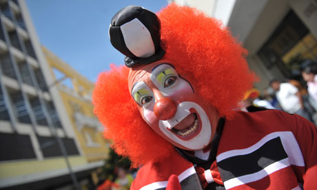 A clown poses during a parade in Guatemala City during the III Latin American Clown Congress