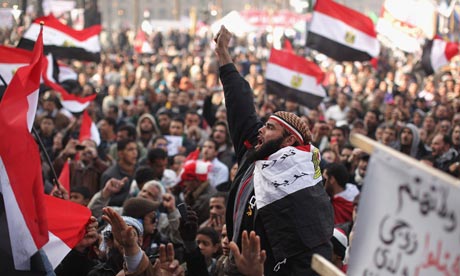 Egyptians gather in Tahrir Square to mark the one year anniversary of the revolution 