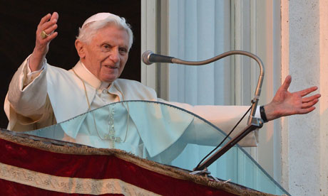 Pope Benedict XVI waves to the faithful from a balcony at Castel Gandolfo